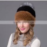 Wonderful mink knitted fur hat with raccoon fur pom pom