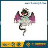 wholesale promotional fashionable creative metal glitter lapel pin with epoxy