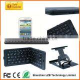 Folding Wireless Bluetooth Keyboard for Iphone/ipad/tablet thumbnail-1