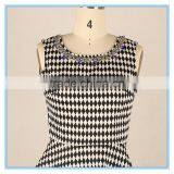 Elegant Ladies Modern Check Sleeveless Blouse Design With Jewel Neck Designs Flounce Hem thumbnail-4