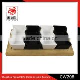 ceramic snack dish with wooden base