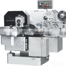 Horizontal double twist candy wrapping machine