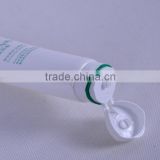flexible tube with two color flip top cap for soothing cleanser packaging