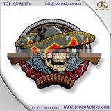 cheap custom fabric &wool skull and guns embroidery patches with self-adhesive ( white hot cut border )