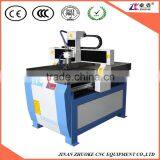 1500W Small Stepper Spindle Aluminium Profile Metal Cutting CNC Router 6090 With Stainless Steel Water Slot Mach3 Control
