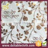 Garden Vines Embossed Pearlescent Plastic Tablecloth With Non-wovn Backing