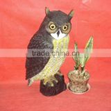 Plastic blowing owl for garden use