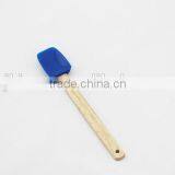 scraper with wooden long handle