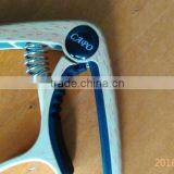 Newly Created Guitar Capo in Wooden Color With Screwdriver Design and Teeth Shaped Silicone Directly From Factory thumbnail-3