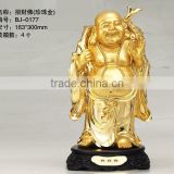 Gold happy laughing Buddha statue