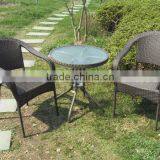 Confortable PE rattan stackable chair small glass top table for patio