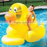 Water Children mounts inflatable yellow duck.