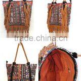 Vintage leather fringe tribal handbag