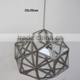 Brass and glass pendent lamp in antique brass finish Ball style