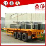 Low Price 40T Tri-Axle 20ft 40ft Container Flatbed Semi Trailer thumbnail-1