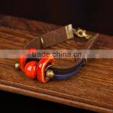 Retro Chinese Red Handmade Leather Ceramic Bead Bracelet With Bell on it thumbnail-2