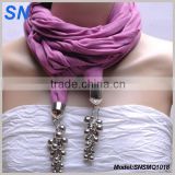 Women scarf with jewelry pendant