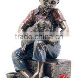 Bronze Sitting Boy Feeding Dog Statue thumbnail-1