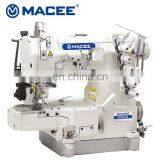 MC 600-03 HIGH-SPEED CYLINDER -BED INTERLOCK SEWING MACHINE WITH REAR PULLAR thumbnail-1