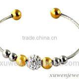 Two Tone Gold Plated 316l Stainless Steel Cable Wire Bangle With Ball Charms