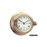 Art. 2256 Quartz clock set in solid brass marine case with opening face
