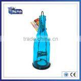 Tea Light Colored Glass Tea Light Bottle Lantern. Recyclable Glass Bottle With Metal Hook Base and Tea Light Candle Holder.