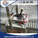 Semi-auto Boxes Sealing Strapping Machine thumbnail-2