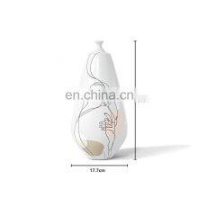 Modern Nordic Desigh Abstract Face Porcelain Ceramic Flower Vase For Home Decor thumbnail-3