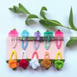 China factory price assorted modern design pink rose flower fabric hair pin wool felt clip hair with green leaf for children