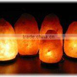 Different Shaped Rock Salt Lamp With Wooden Base thumbnail-1