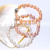 Wholesale the near round 8-9mm natural pearl source