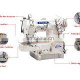 MC 600-03 HIGH-SPEED CYLINDER -BED INTERLOCK SEWING MACHINE WITH REAR PULLAR thumbnail-2