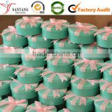 Bulking round varnished tin box with bow ribbon lid                        
                                                Quality Choice
