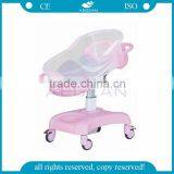 Pink Color AG-CB011 CE ISO Movable Hospital Plastic Baby Crib Medical Infant Cot thumbnail-1