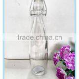 Popular 500ml Clear glass bottle with lid for wholesale