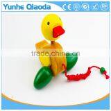 Colorful Pull Along Duck Wooden Toy as You Pull They Make a a Fun Baby thumbnail-3