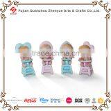 Polyresin Baby Sculpture With Chair Shoes Horse Photo Frame Leaf Holding Baby Figurine Resin Cute Baby Statue thumbnail-2