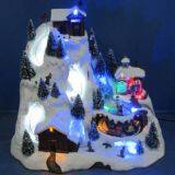 Polyresin Christmas Decoration 12'' LED mountain  sence with rotating train,dancing people,skiing childs , eight songs