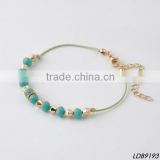 faced green glass cord bracelet