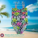 Older Girls Leopard Hibiscus Swimsuit adorned by contrast strap