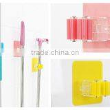 Wholesale Stock Magic Wall Suction Plastic Mop Handle Storage Holder thumbnail-4
