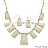 Gold Tone Fashion Necklace and Earring Set With Faceted Ivory Acrylic