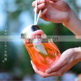 Best Sell Lovely Round Shape Glass Tea Infuser Bottle With Sleeve and Tea Holder thumbnail-2