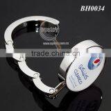 Saudi Arabia Souvenirs Promotional Round Portable Foldable Handbag Holder Hook Zinc Alloy Metal Dubai Print Custom Bag Hanger thumbnail-4