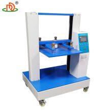 Compression testing machine for stacking multi-layer cardboard boxes