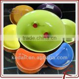 Colorful ceramic serving dish with wooden