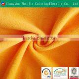 Changshu textile wholesale 100% polyester orange color coral fleece fabric