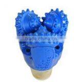 Tricone drill bit