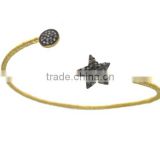 Gold bangle with stars