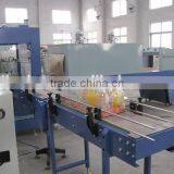 Automatic hot shrink film wrapping packing machine